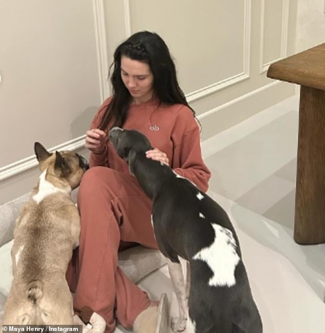 She also spent a lot of time with her pets this year and shared a photo with them as part of the album