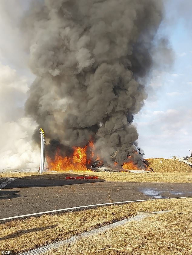 The Jeju Air plane in flames at Muan International Airport in Muan, South Korea, Sunday, December 29, 2024