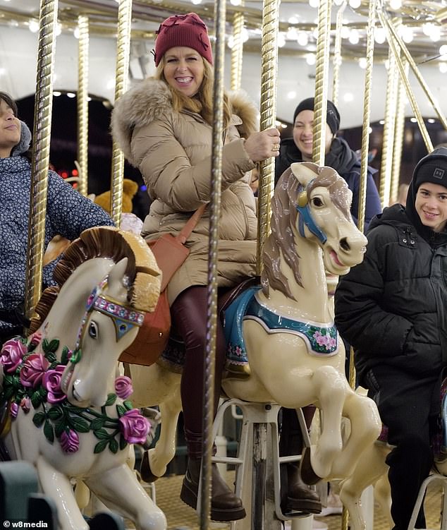 Kate wrapped herself warm in a padded beige jacket and pink hat, while Darcey wore stylish earmuffs