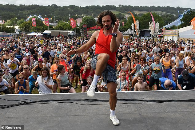 In a new interview, Wicks, 39, who rose to fame for his PE training videos with Joe during Covid lockdowns, has said he didn't 'say ADHD is caused by poor nutrition'. Pictured: Wicks at the Glastonbury Festival earlier this year