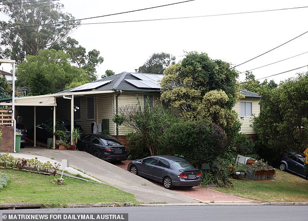 There were three cars parked in the driveway of Campos' home (above) on Monday, but a woman who spoke through the front door said no one inside wanted to talk