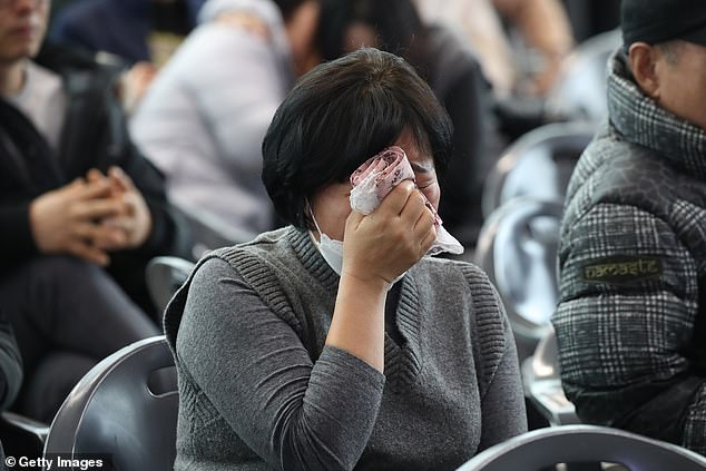 A relative of a passenger at Muan International Airport on December 30