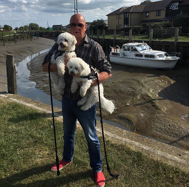 James, seen above with two of his dogs, has said that only those who have experienced the death of a pet can understand the pain of their passing