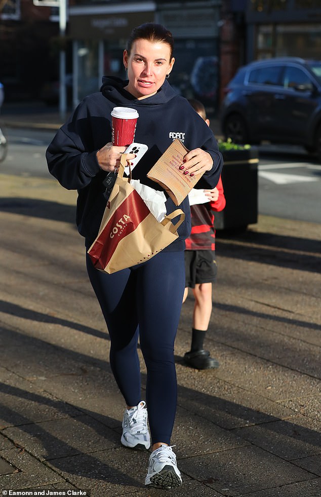 The I'm A Celeb star cut a casual figure for the outing in a navy blue hoodie which she paired with matching leggings