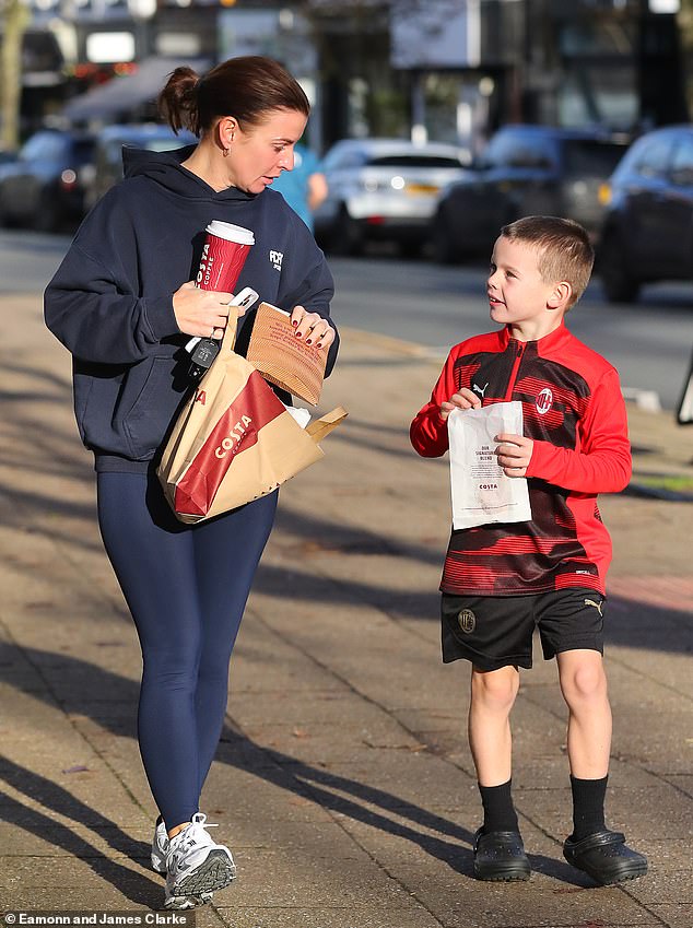 The WAG tied her brunette locks into a ponytail and slipped her feet into a pair of comfortable white trainers