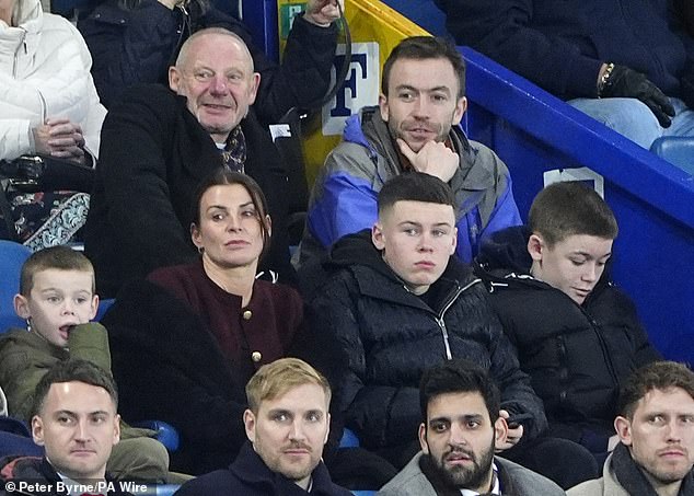 Yesterday she brought her sons Kai, Cass and Kit to watch their father's old team, Everton, play