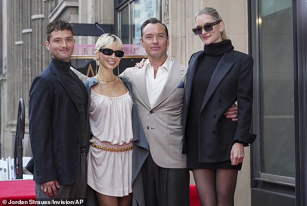 Rafferty (left) and Iris Law (second from left) with father Jude and his second wife Phillipa Coan during the actor's new star ceremony on the Hollywood Walk of Fame in December