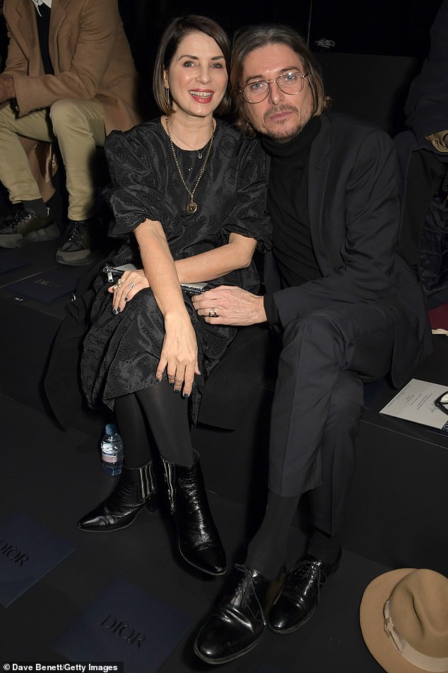 Speaking in April, Frost confirmed she is single after drawing a permanent line under her eight-year relationship with businessman Darren Strowger (pictured together at Paris Fashion Week in 2020)