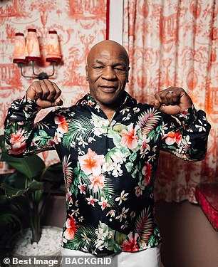 Tyson wore a brightly colored Hawaiian shirt for the occasion