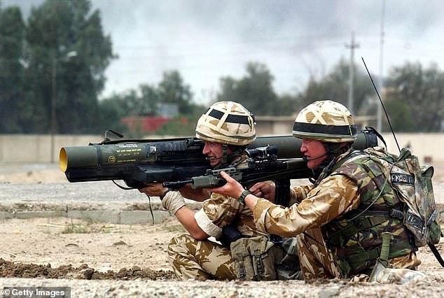 Company Irish Guards fired on Iraqi troop positions in southern Iraq in April 2003. The row came after the former US president famously declared 'mission accomplished' as Saddam Hussein was overthrown.