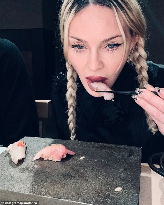 During their meal, she took a selfie while eating