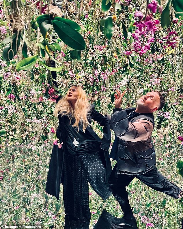 Then, Madonna and her boyfriend also posed for a cute photo in the same room