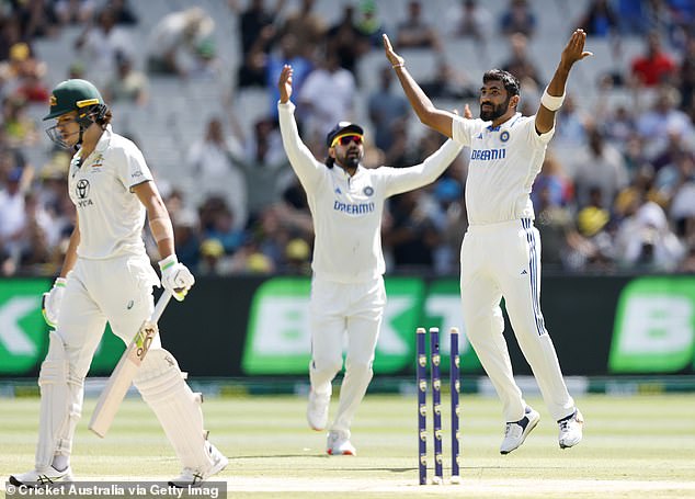 Jasprit Bumrah (right) is pictured after taking the wicket of Konstas at the MCG