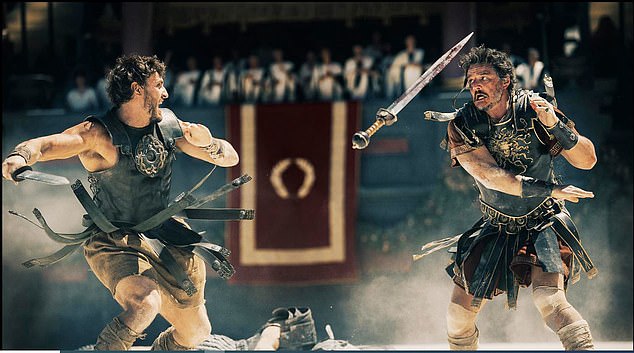 Paul Mescal (left) and Pedro Pascal (right) in Gladiator II. Andrew Neil complains that every time someone pours a glass of wine in the film, the words 'alcohol consumption is harmful' appear at the bottom right of the screen