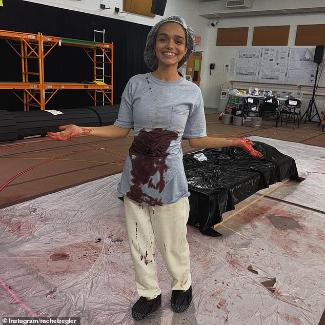 Another photo showed her covered in fake blood during rehearsals for the play