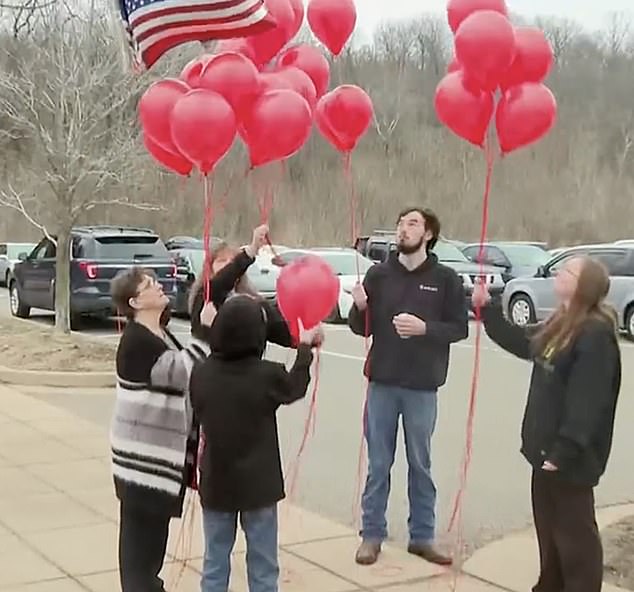 A balloon was released as family members and friends paid tribute to Kevin