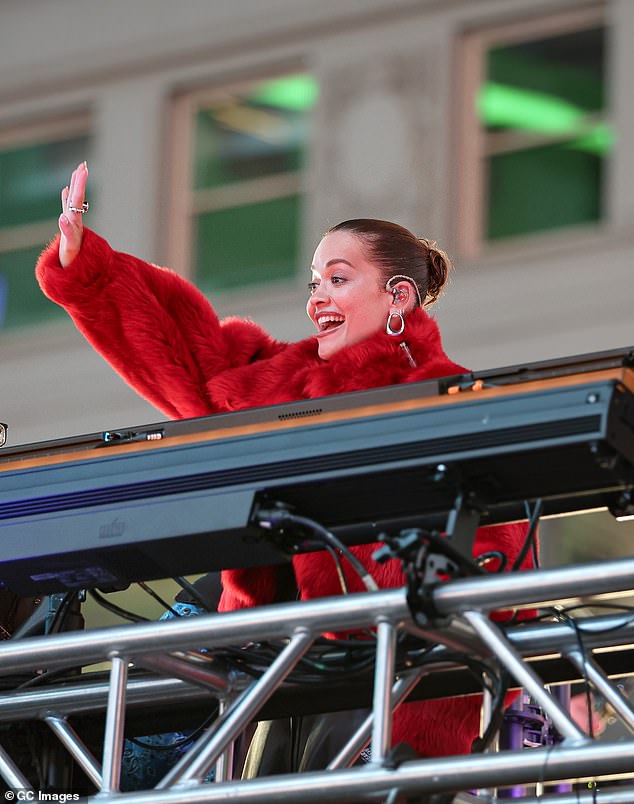 Rita waves to the fans