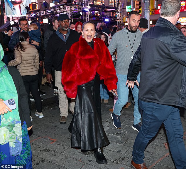 She stayed warm in a pair of thick black boots