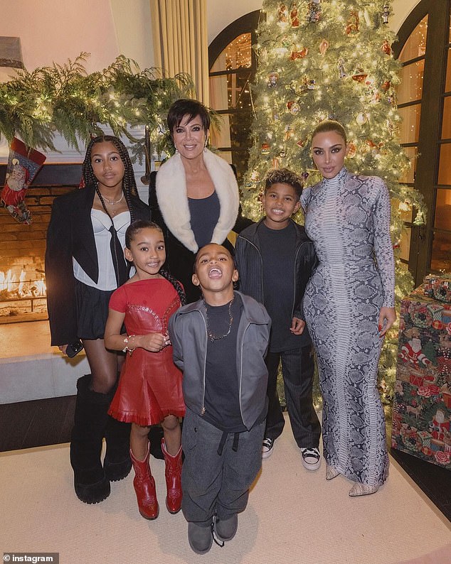 The 44-year-old mogul celebrated Christmas Eve in style with her four children – North, 11, Saint, nine, Chicago, six in January, and Psalm, five – and other family members; pictured with mother Kris Jenner