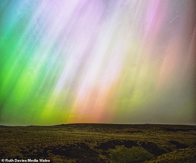 Most CMEs over the past 24 hours are considered distant, meaning they will not impact Earth. However, astronomers have discovered one heading our way that could ignite the Northern Lights just in time for New Year's Eve. Pictured: Northern Lights seen in Wales in May