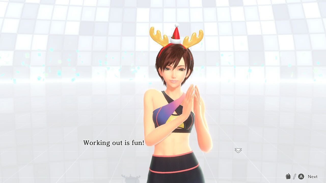 One of the trainers from Fitness Boxing 3, wearing a pair of reindeer horns in the form of a headband, says: 