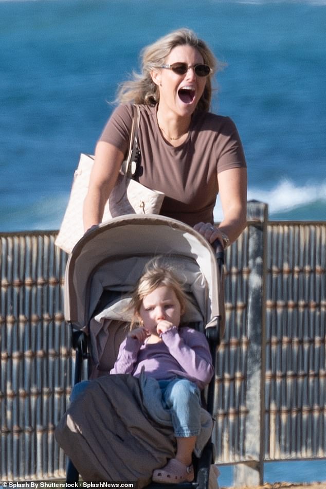 Danielle pushed her eldest daughter Orla into the stroller