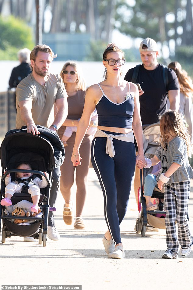 Ferne was accompanied by Lorri, who was seen pushing their daughter Finty, 16 months, in her pram along the coastal path