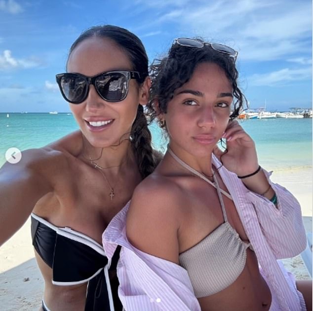 Here she was seen with her mini-me daughter wearing a beige bikini top