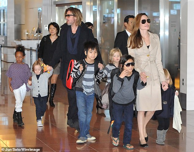 By the time Jennifer and Pitt finalized their divorce in October 2005, Jolie was two months pregnant with their daughter Shiloh and the couple was in the process of adopting more children (pictured in 2011).