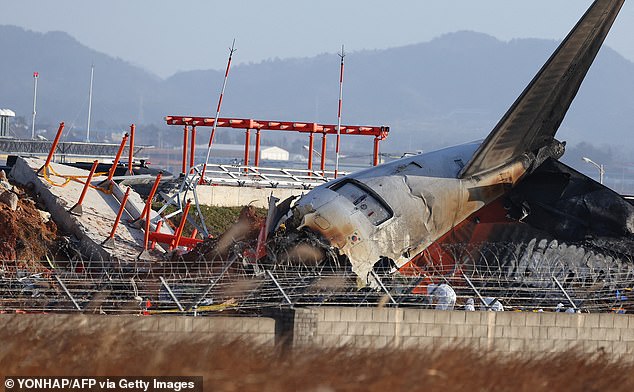 Part of the wall where a Jeju Air Boeing 737-800 series plane crashed and caught fire