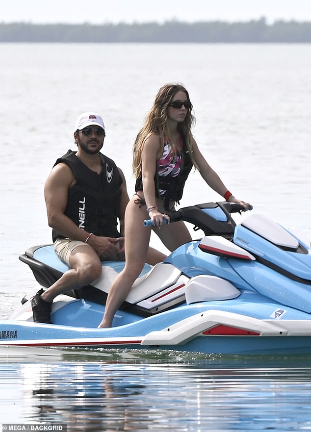 She also revealed her toned legs as she boarded a jet ski with fiancé Jonathan Davino at her new $13 million Florida Keys mansion