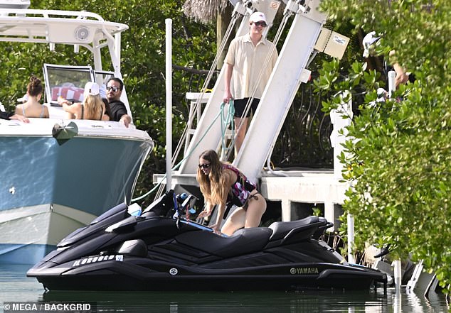 Sydney's friends and family went on her boat while she took a jet ski ride