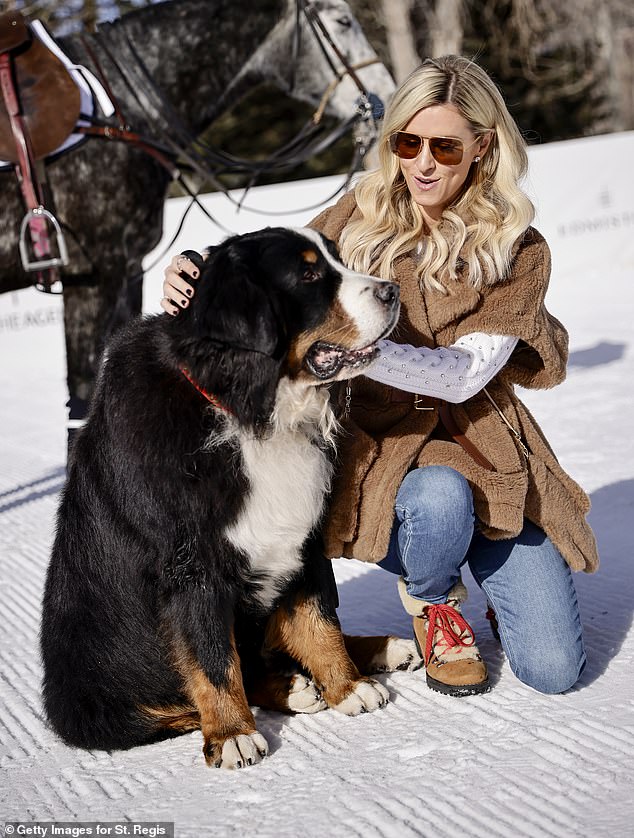 While there, she met the Aspen St. Regis mascot, Kitty the Bernese Mountain Dog, and hung out. Seen here on December 19, 2024