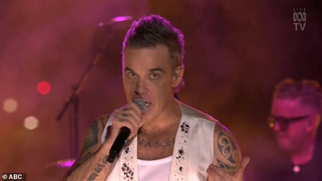 Robbie's stellar performance was further marred by an awkward exchange with an audience member during the song Land of 1000 Dances