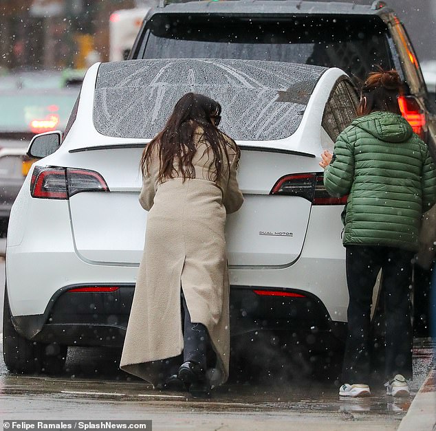 The Devil Wears Prada actress, who shares sons Jonathan, eight, and Jack, five, with husband Adam Shulman, wrapped warm in a chic winter coat