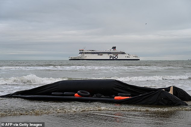 Life jackets, buoys and a deflated inflatable boat can be seen as a P&O Ferry sails in the background, after a failed attempt by migrants to illegally cross the English Channel to reach Britain, on Sangatte beach, near Calais, Northern France. December 4, 2024. Archive photo