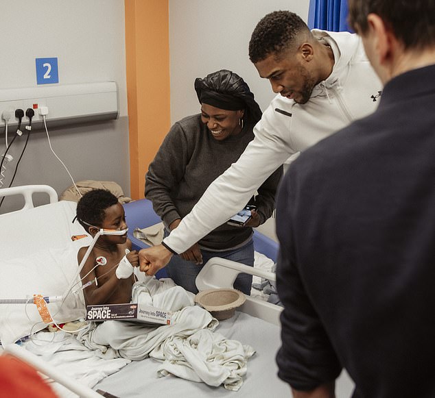 Anthony Joshua brought festive cheer to Watford General Hospital on Thursday afternoon