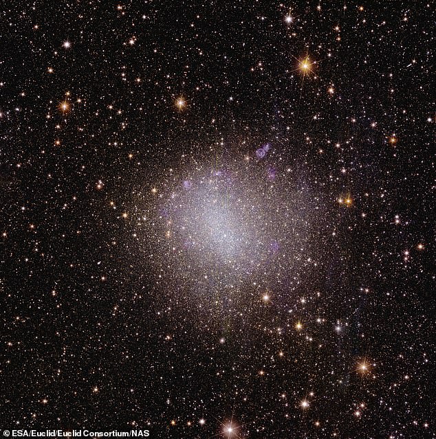 Dwarf galaxies contain only a few billion stars, while standard galaxies have hundreds of billions. This is the irregular dwarf galaxy NGC 6822, which is not part of the newly found group