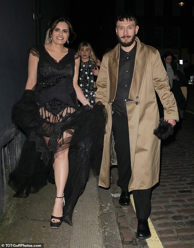 Baby Reindeer's Nava Mau turned heads in a black embellished sheer dress as she and Richard Gadd arrived at The Chiltern Firehouse for the Fashion Awards after-party in London on Monday