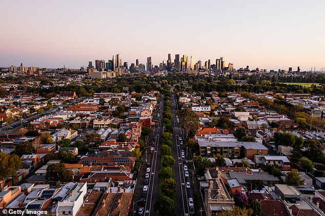 Research firm RLB has predicted construction costs will continue to rise as Australia grapples with a worsening housing crisis (pictured, an aerial view of Melbourne)