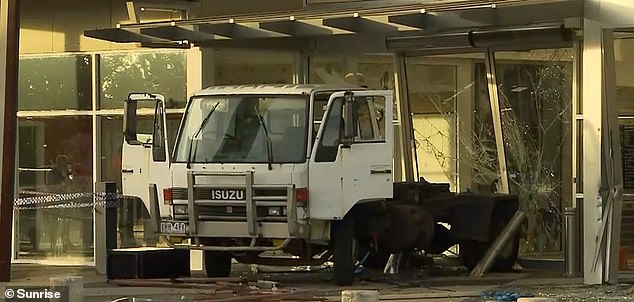 A truck rammed into a small shopping center in Melbourne during a ram raid on Monday morning