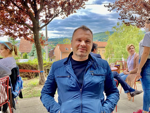 Mark Viduka relaxes in Zagreb, near the coffee shop he now runs