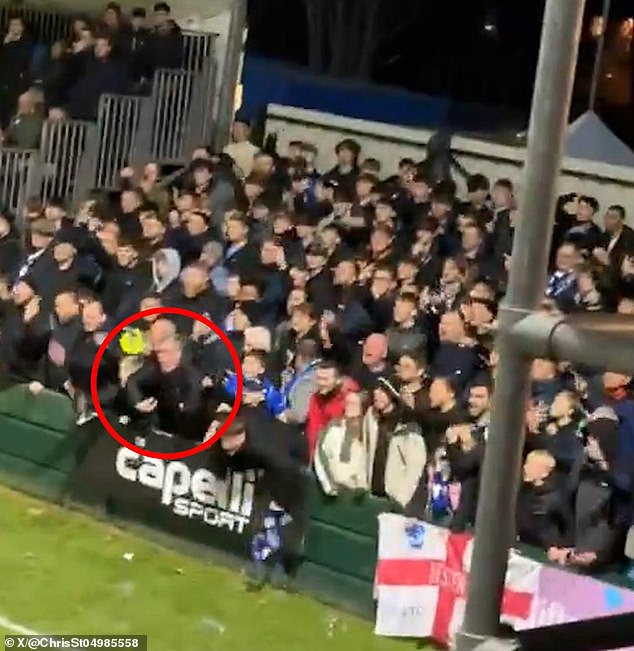 A man among Chester FC fans was seen on camera making an alleged monkey gesture towards Warrington Town player Bohan Dixon after his side scored on Saturday