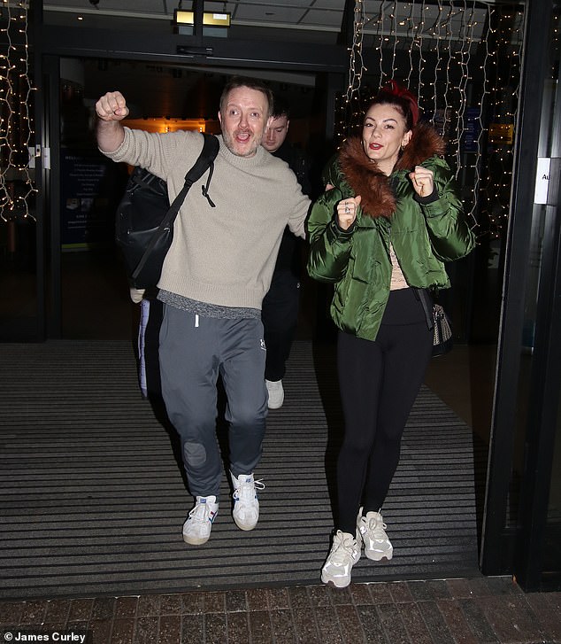 Chris McCausland and Dianne Buswell looked in good spirits as they led the Strictly stars as they left a hotel in London on Saturday morning