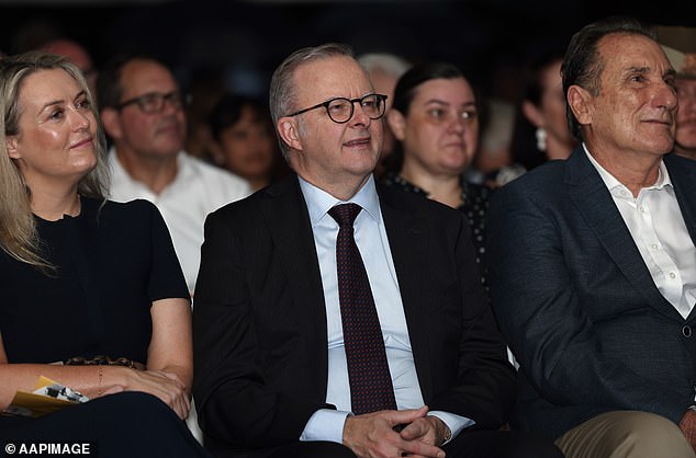 Mr Albanese (centre) praised Darwin residents for their 'profound courage' and described the cyclone as 'nature at its very worst'