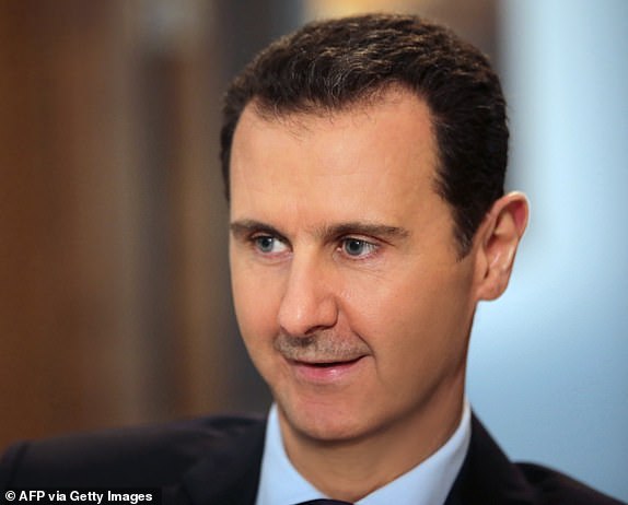 (FILES) Syrian President Bashar al-Assad listens to a question during an exclusive interview with AFP in the capital Damascus on February 11, 2016. Assad is under increasing pressure as his army faces setbacks, the economy worsens, his support declines and his government's foreign backers are concentrated elsewhere. Aleppo's rapid fall to Islamist-led rebels in the last week of November 2024 and their subsequent advance into central Syria have shaken its legitimacy and emboldened its opponents, analysts said. (Photo by JOSEPH EID/AFP) (Photo by JOSEPH EID/AFP via Getty Images)