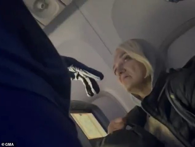 The woman who allegedly sneaked onto a Delta Airlines flight from New York to France last week, named Svetlana Dali, was seen in surprising new footage as flight attendants begged not to 