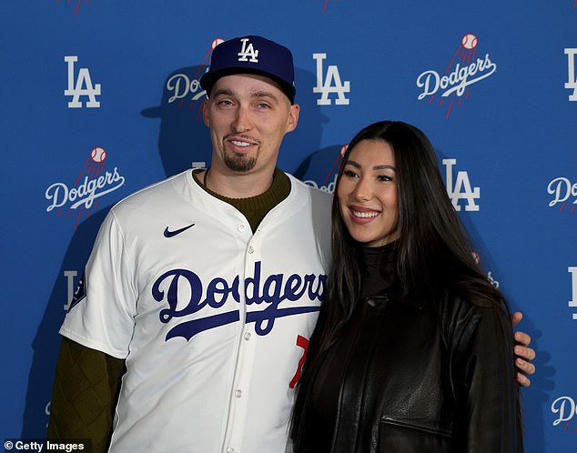 Blake Snell and girlfriend Haeley Mar pose for a photo after signing his nine-figure deal in LA