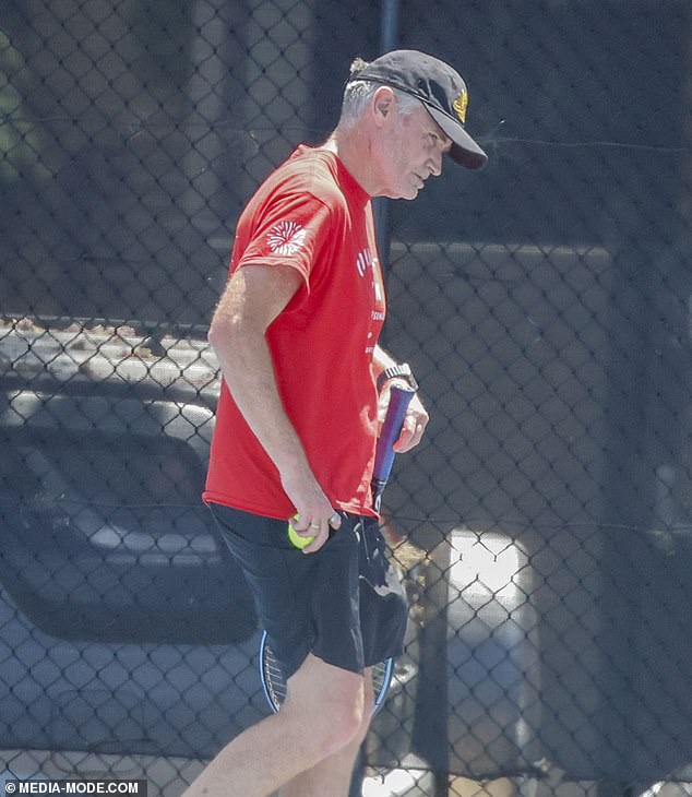 Dave Hughes (pictured) looked pretty down as he took to the tennis court for a hit on Tuesday