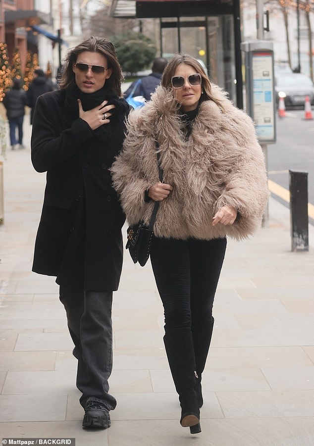 Elizabeth Hurley and her look-alike son Damian looked stylish while shopping in Chelsea on Wednesday